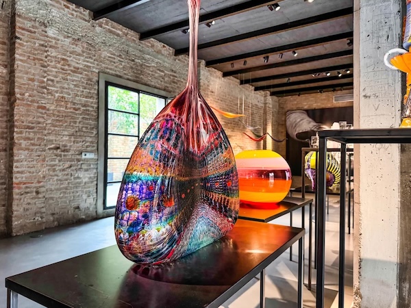 Colorful glass sculpture in gallery